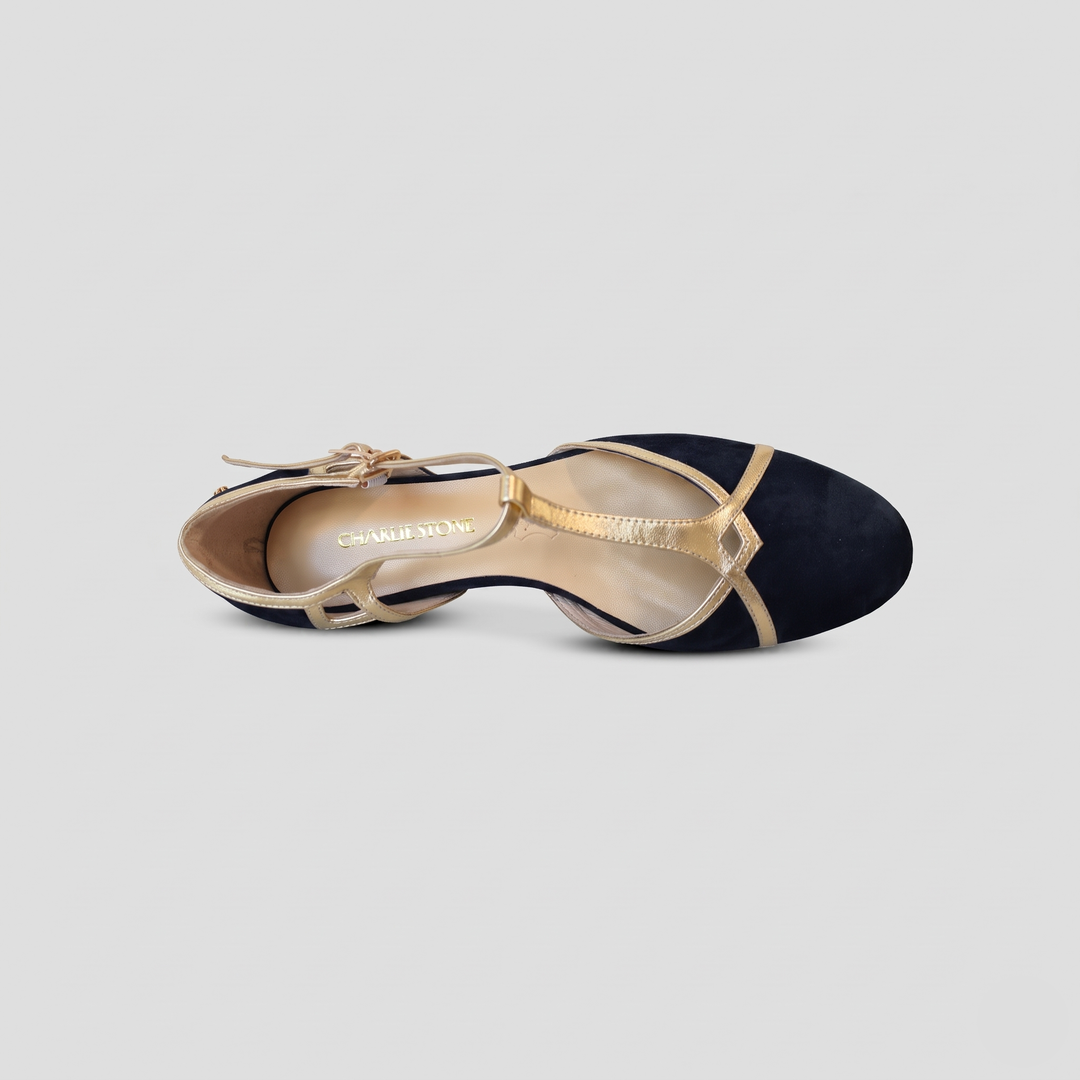 Top view of Charlie Stone Budapest black suede and gold T-strap flats