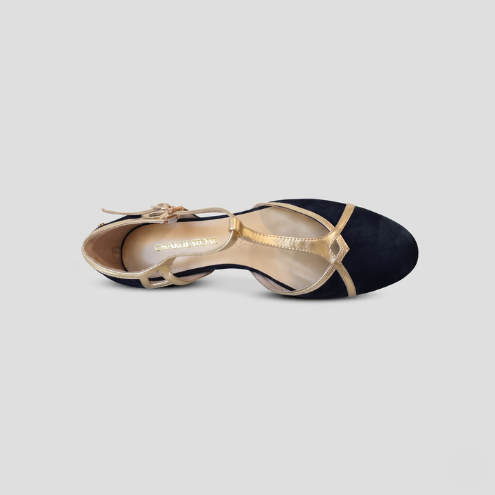 Top view of Charlie Stone Budapest black suede and gold T-strap flats